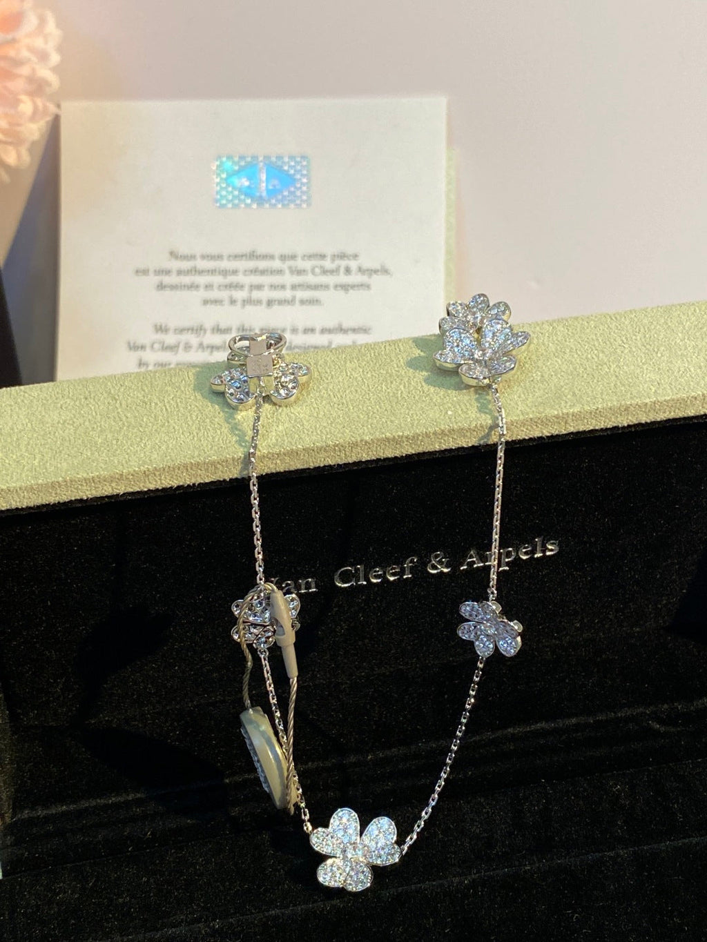 an Cleef & Arpels Pavé Diamond Clover Necklace